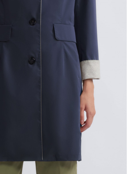 Water resistant tech satin blue overcoat with jersey details