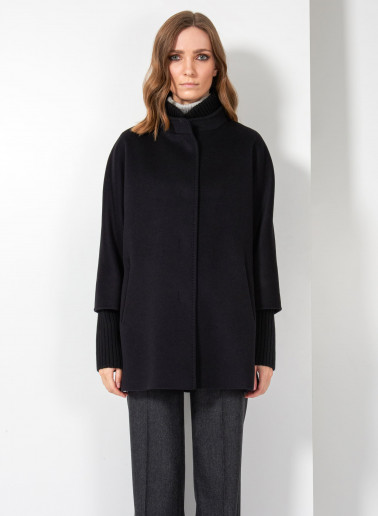 Short oversized black pure wool coat with knitted details