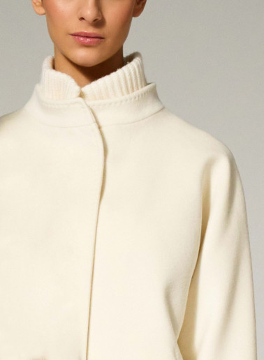Short oversized white pure wool coat with knitted details