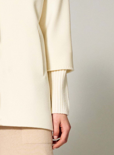 Short oversized white pure wool coat with knitted details